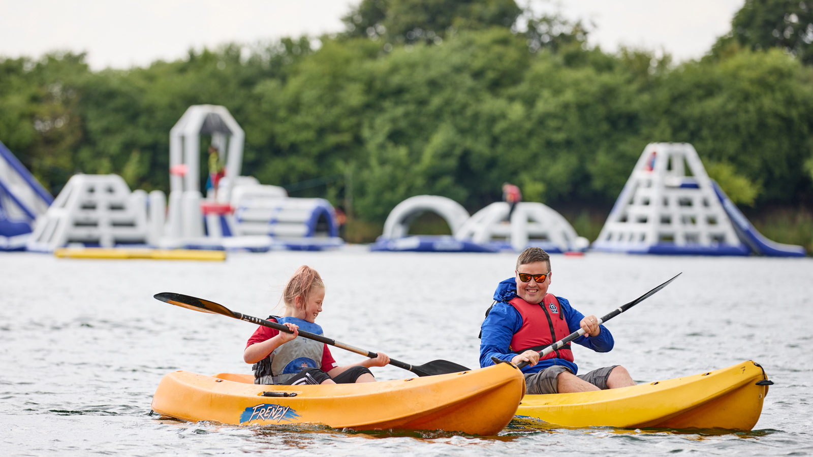 Hatfield Outdoor Activity Centre Aquapark two people swimming