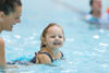 Kid learning to swim