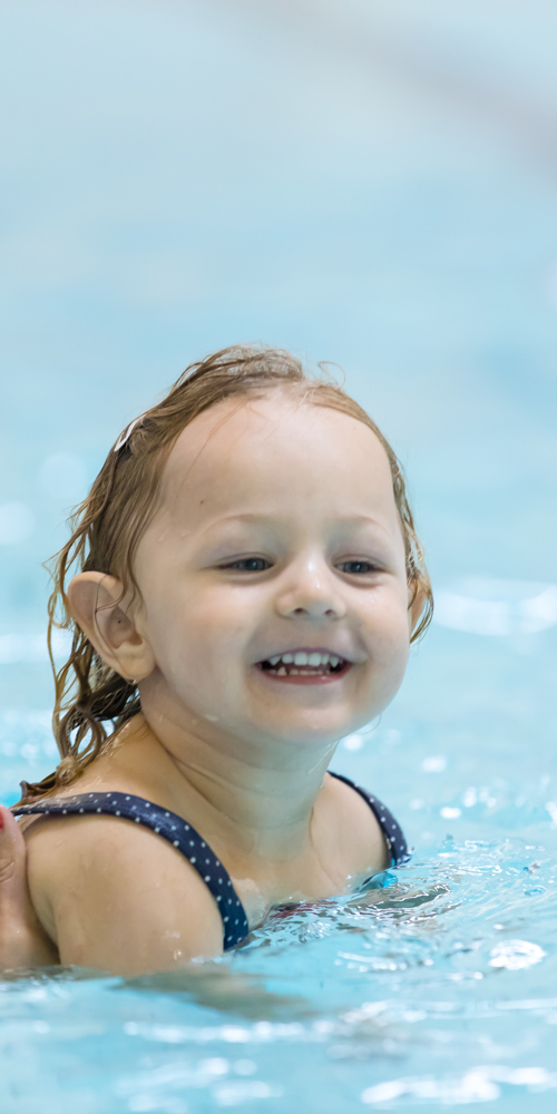 Kid learning to swim
