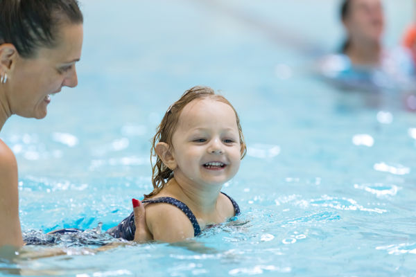 Kid learning to swim