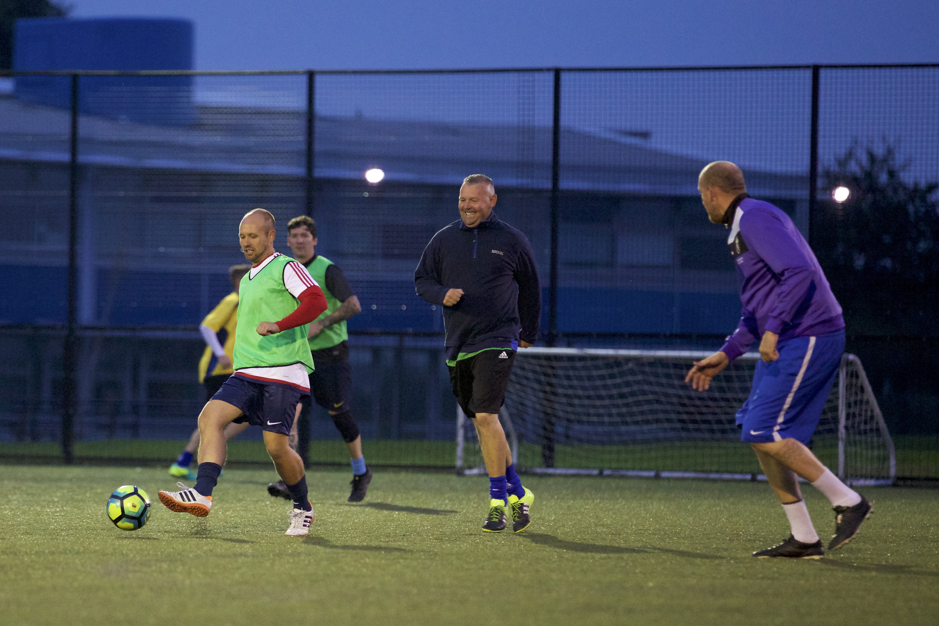 People playing football