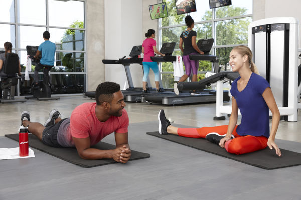 People stretching and laughing